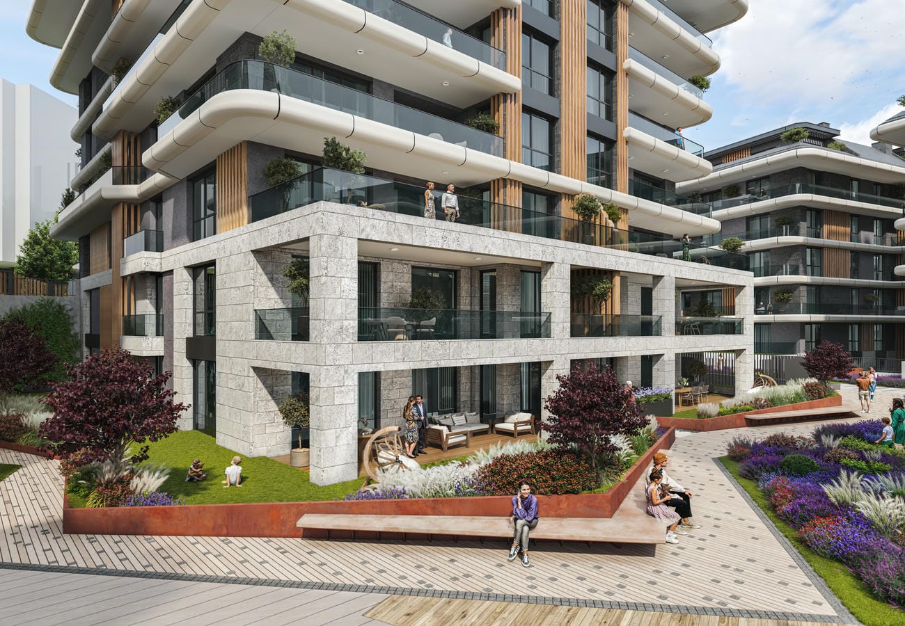 Apartmanların yanında açık taş kaplamalı köşe cephe, teras ve çiçeklik boyunca uzun bank