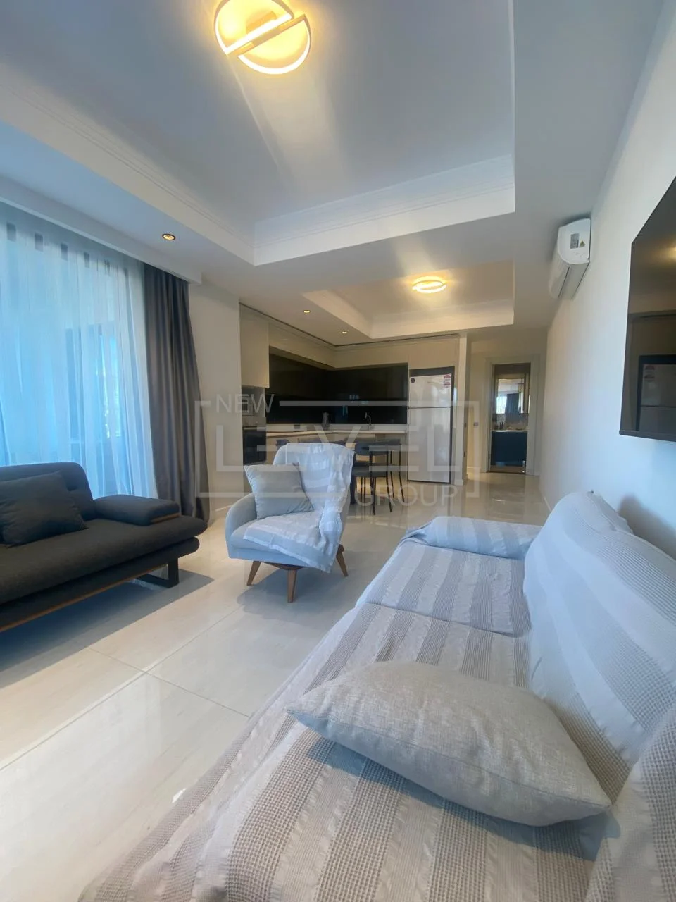 Alanya, Türkler semtinde, lüks I4 tatil kompleksinde kiralık üç odalı, eşyalı daire.