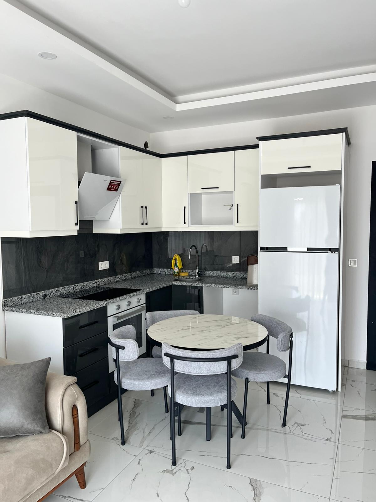 Avsallar 3. Bölge'de modern bir sitede yer alan 1+1 dairenin uzun süreli kiralanması.