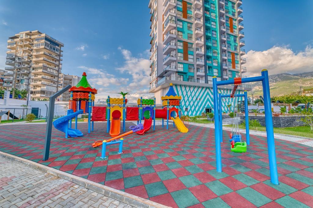 Квартира 1+1 с видом на море в Махмутларе