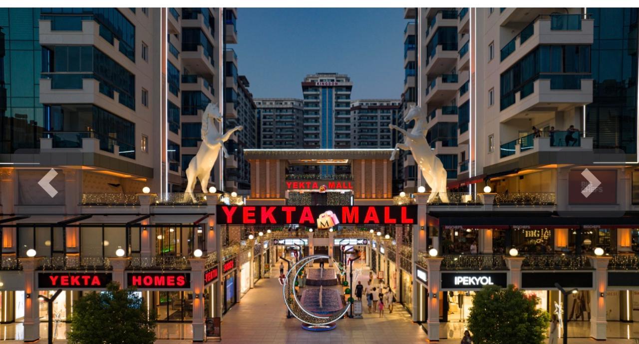 Mahmutlar'ın merkezinde, 82 m²'lik 1+1 daire – eşyalı, 1 yıla kadar taksit imkanı.