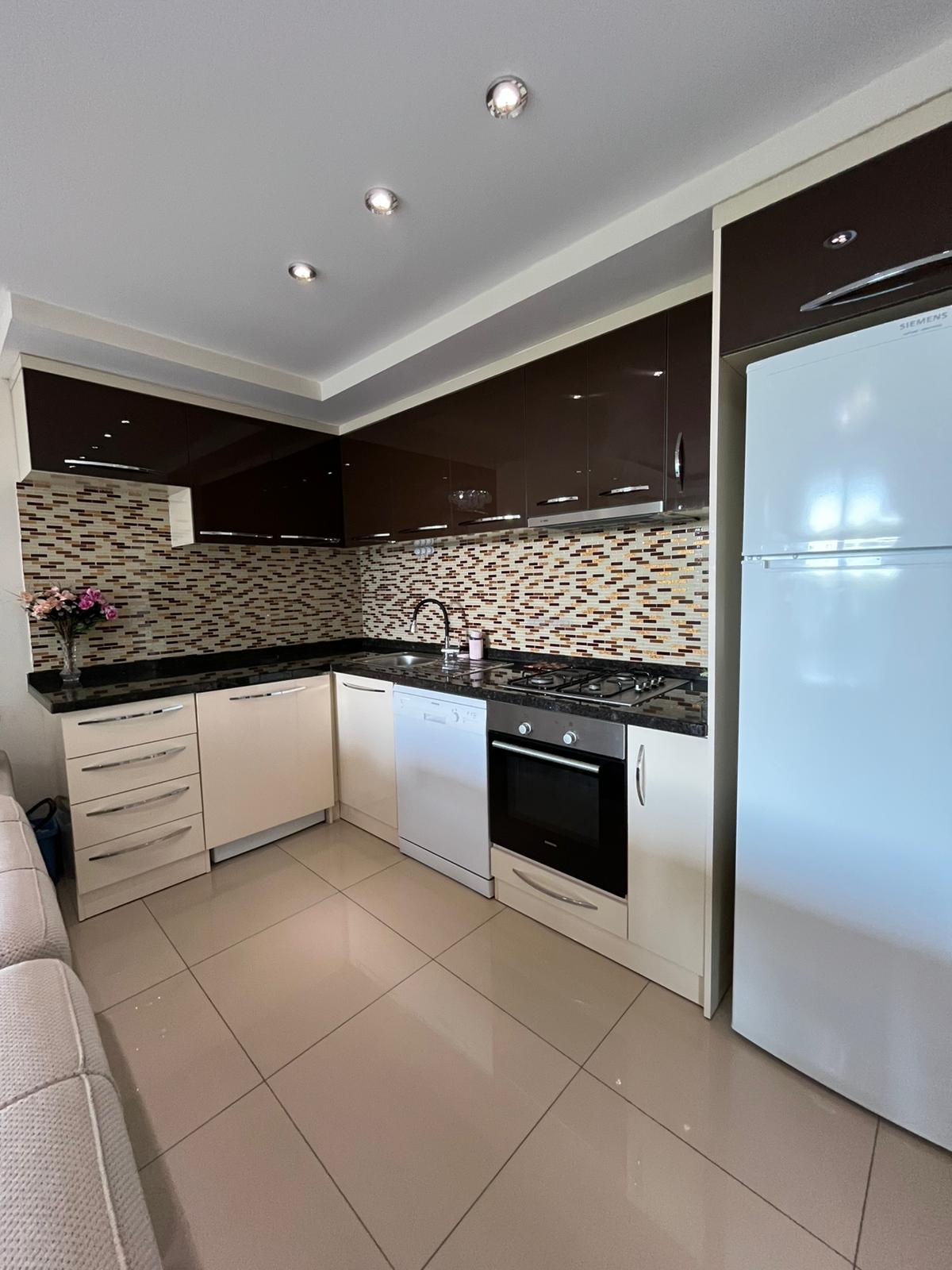 Квартира 1+1 под ВНЖ и гражданство в Алании - 80 м² с мебелью, район Джикджилли
