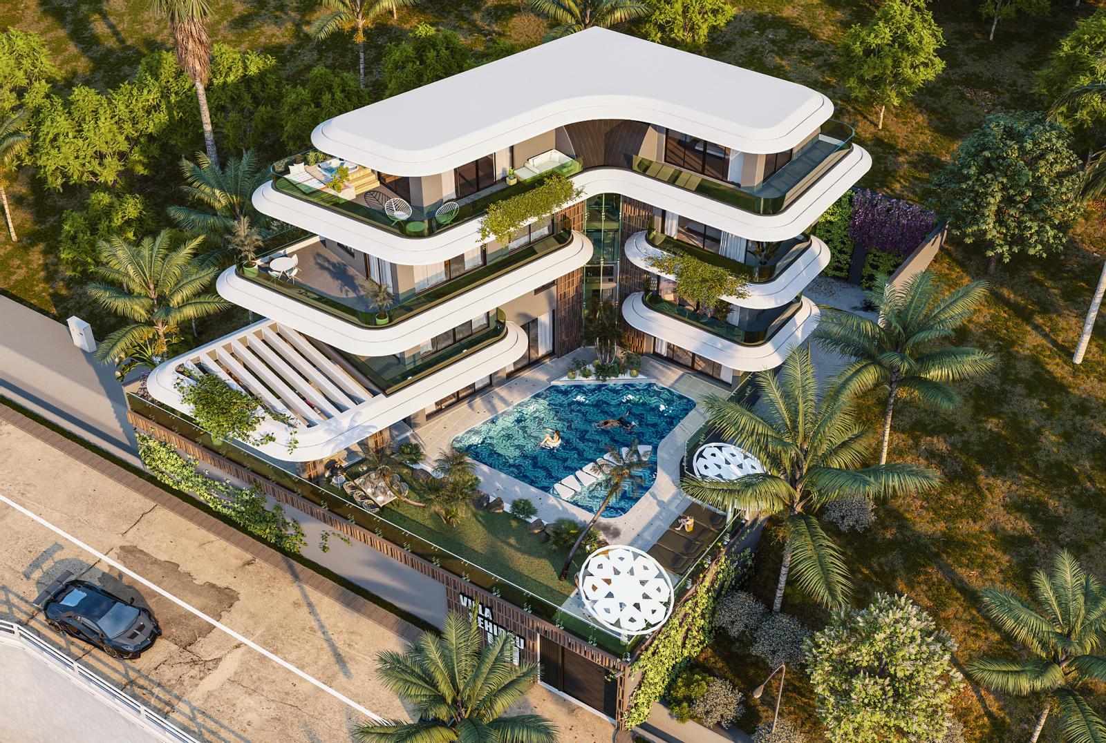 Şezlonglu havuz ve yeşil teraslarla çevrili çok katlı villa Kargıcak’ta yukarıdan görülüyor