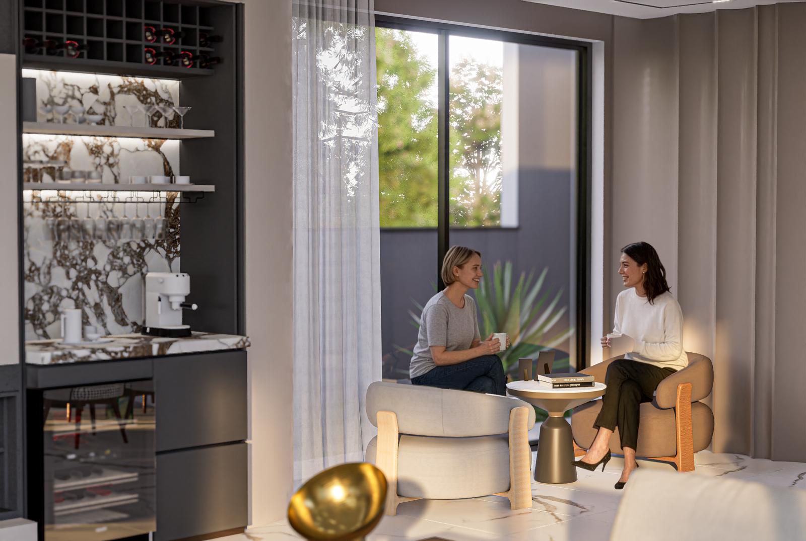 Mermer kaplamalı mutfak dolabı ve şarap rafı bulunan mutfak-salon Türkiye’de
