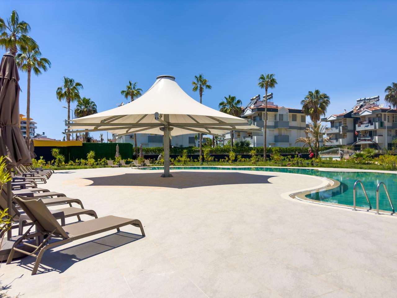 Квартира в Алании, район Тюрклер - 1+1 85 м2 с мебелью в премиальном resort-комплексе