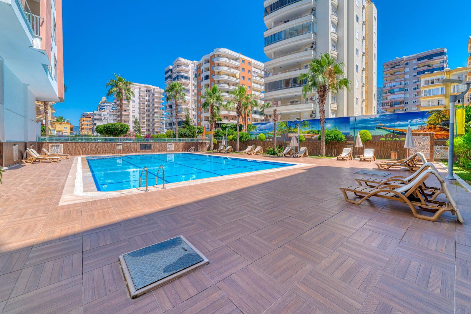 Квартира 1+1 в Алании, район Махмутлар - 70 м², мебель, вид на горы, рядом с морем