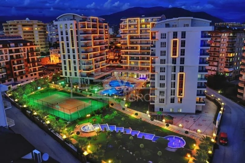 Квартира 1+1 в Алании, район Тосмур - новая мебель, вид на море