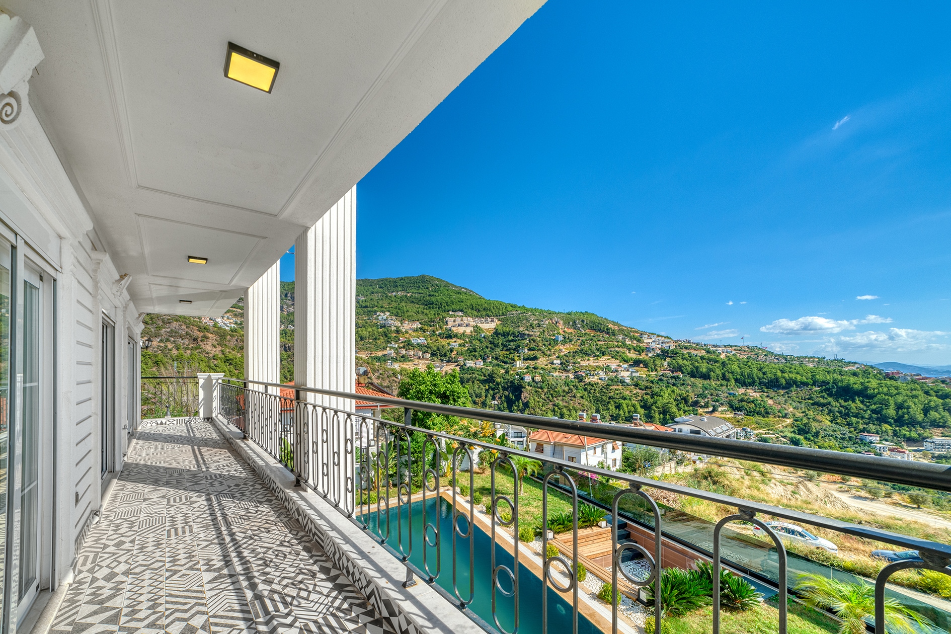 Side terrace with geometric tiles and mountain scenery in Turkey for sale