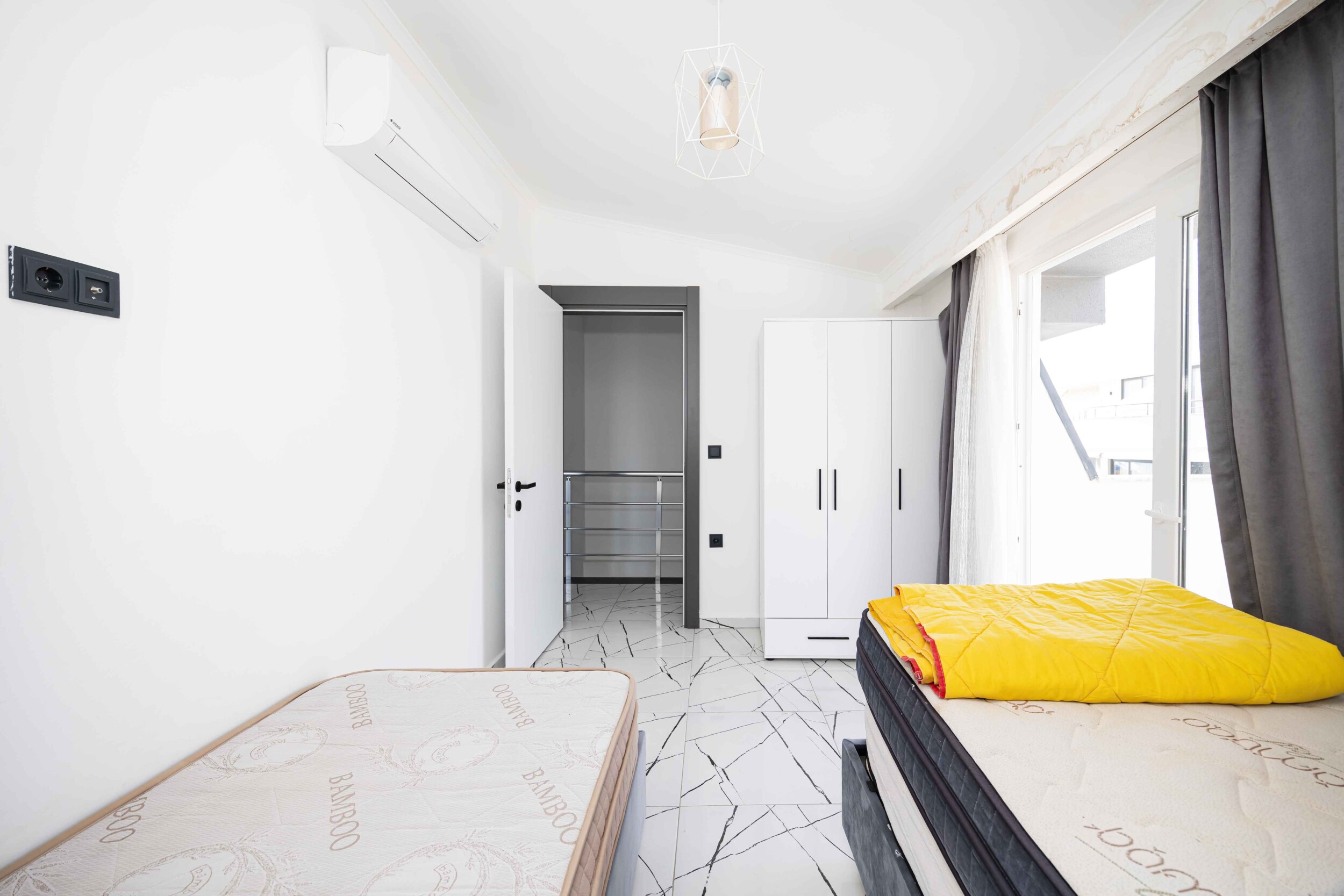 Twin beds, wardrobe and panoramic door in Kargicak