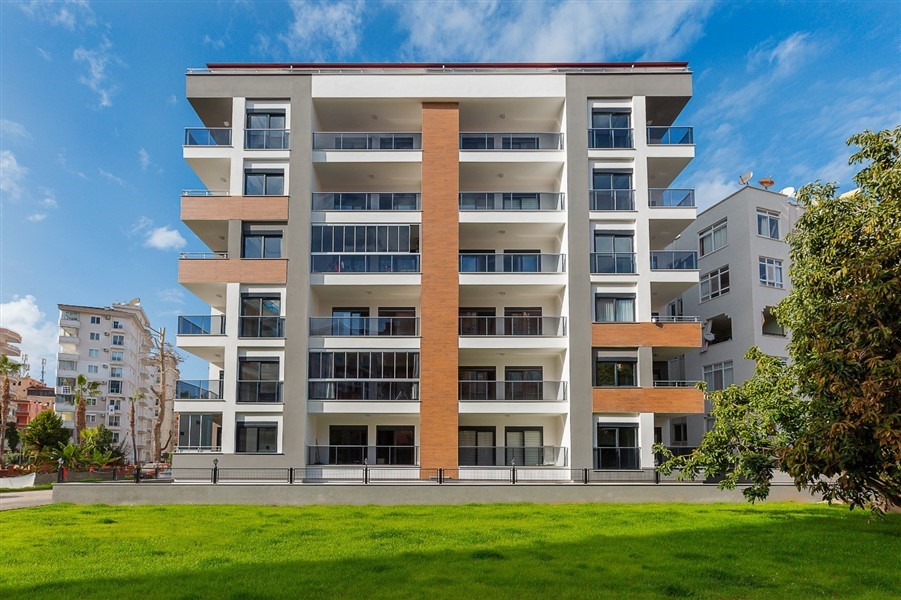 Квартира 1+1 в Алании, район Махмутлар - мебель, остекленный балкон, 250 м до моря
