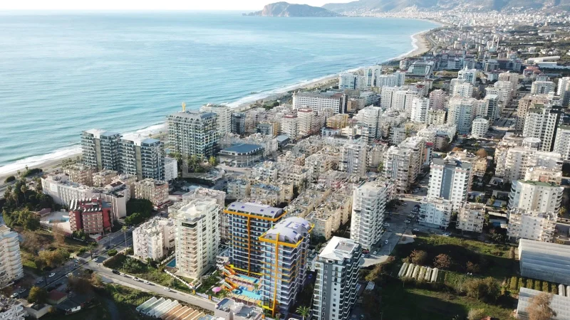 Coastal skyline and shoreline: 2+1 apartment for sale in Mahmutlar, Alanya, Turkey — New Level Group