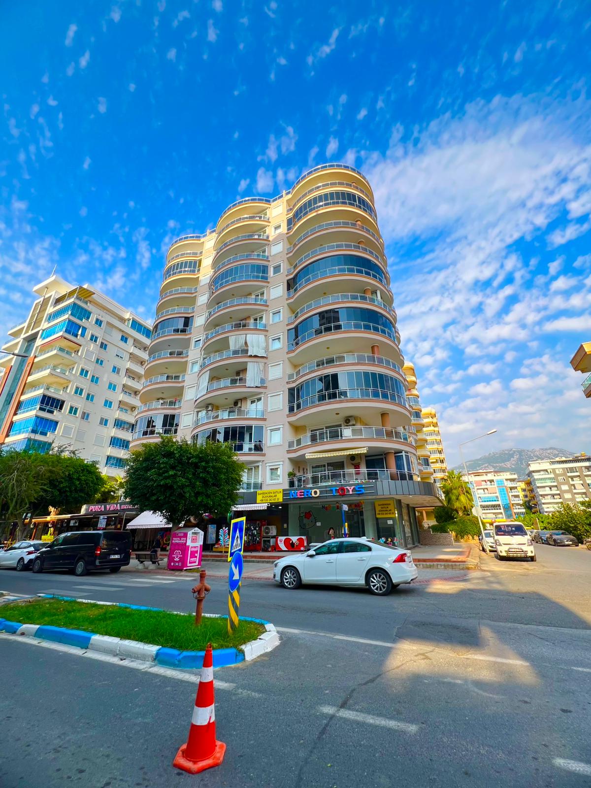 Yuvarlak balkonlu yüksek bina: Mahmutlar, Alanya’da satılık 2+1 daire, Türkiye — New Level Group