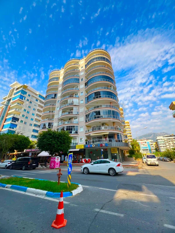 Yuvarlak balkonlu yüksek bina: Mahmutlar, Alanya’da satılık 2+1 daire, Türkiye — New Level Group