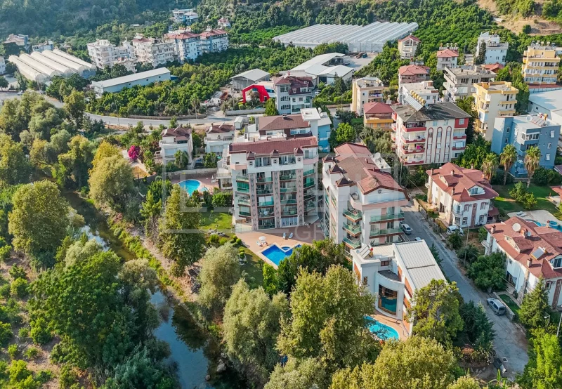 Green complex with pools and a canal: 3+1 penthouse for sale in Kestel, Alanya, Türkiye — New Level Group