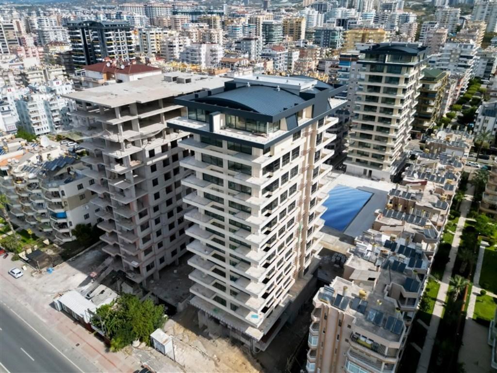Квартира 1+1 в Махмутларе от собственника - 71 м2, первая линия, премиальный комплекс с собственным пляжем