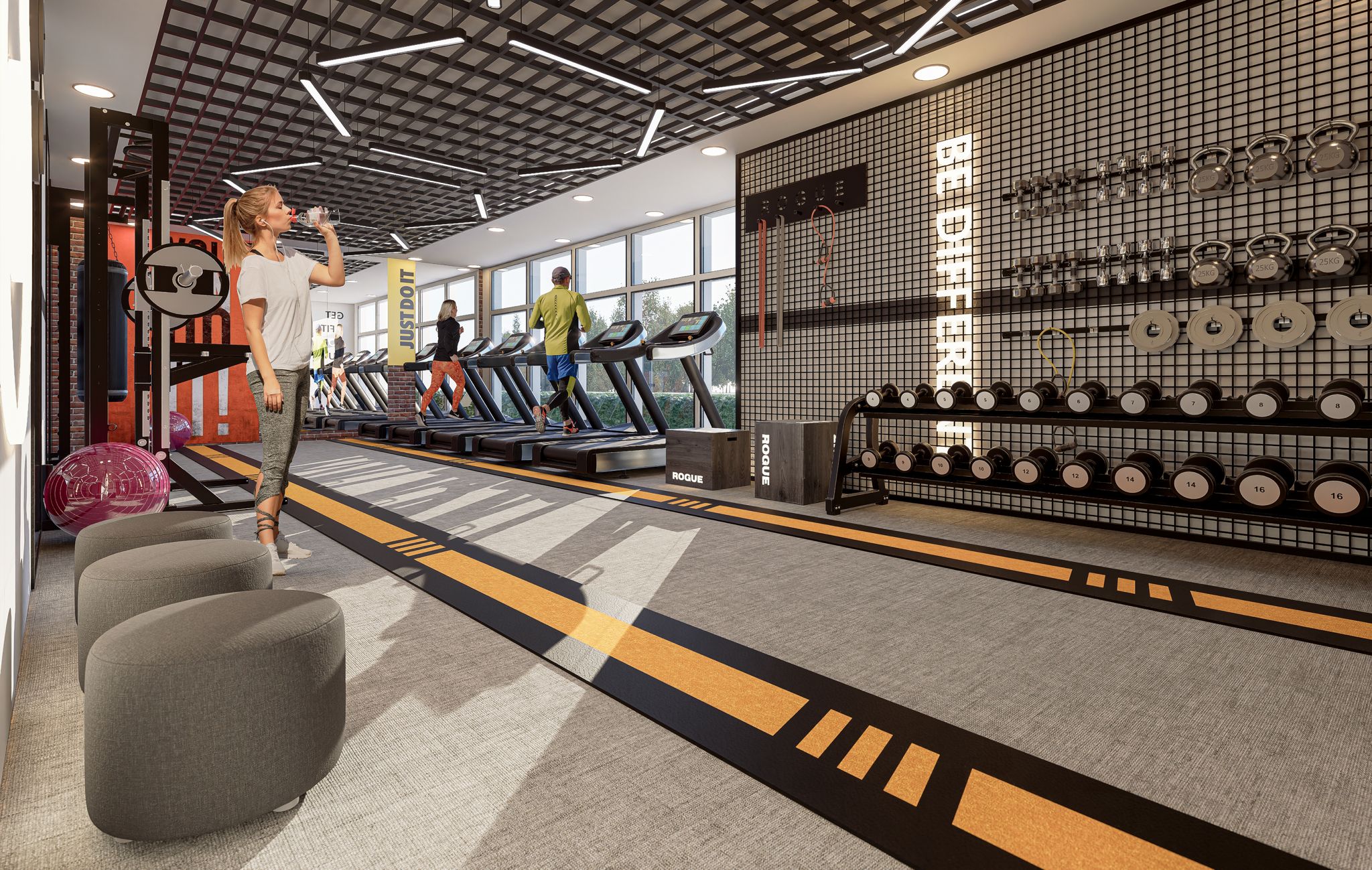 Spor salonunda dambıl rafı ve pencere önünde koşu bantları, Oba’daki sitede