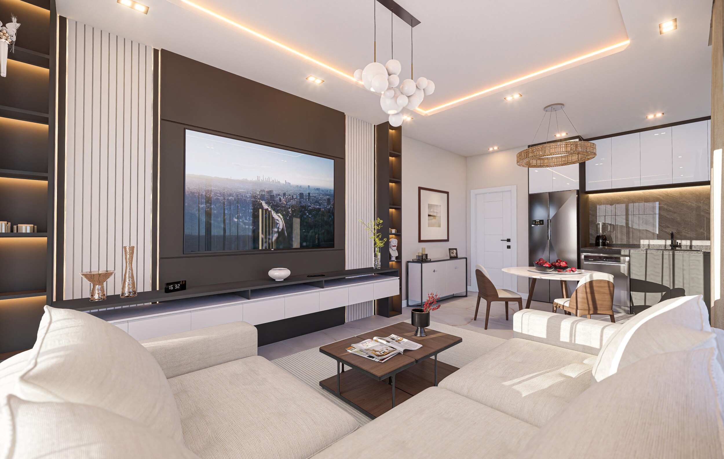 Mutfaklı salonda iki açık renk kanepe ve koyu TV duvarı, Türkiye’de satılık rezidansta