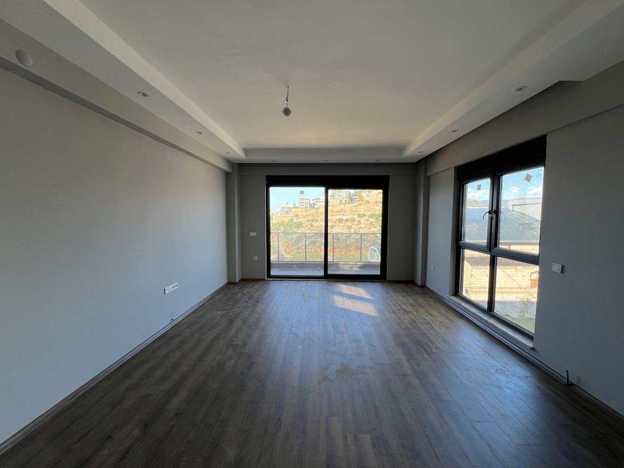 Alanya Konaklı'da deniz manzaralı, modern bir komplekste, şık tasarımlı, yeni 2+1 daire.