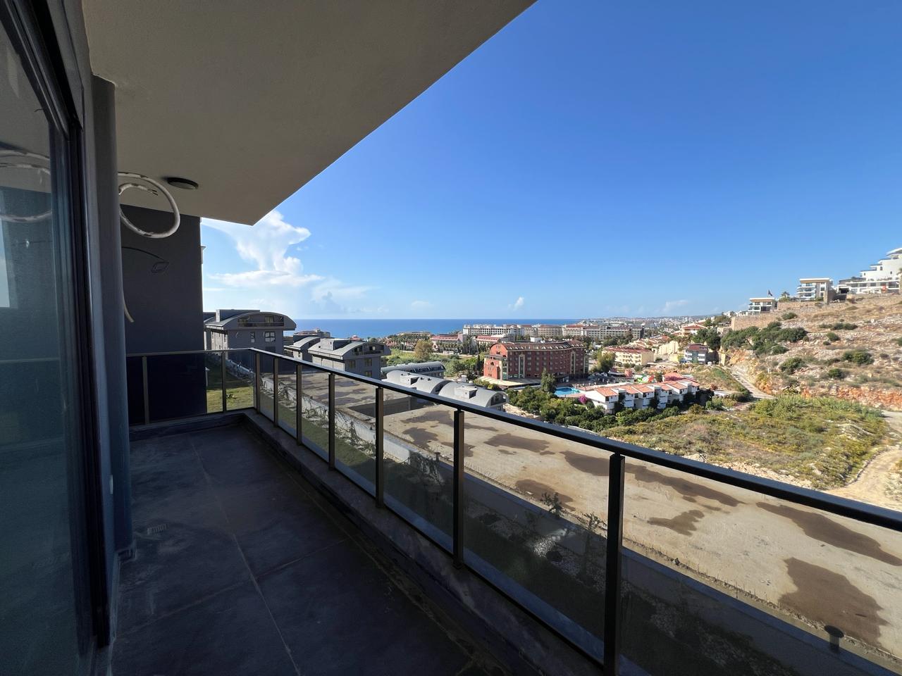 Alanya Konaklı'da deniz manzaralı, modern bir komplekste, şık tasarımlı, yeni 2+1 daire.
