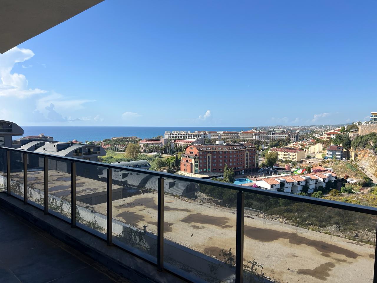 Alanya Konaklı'da deniz manzaralı, modern bir komplekste, şık tasarımlı, yeni 2+1 daire.