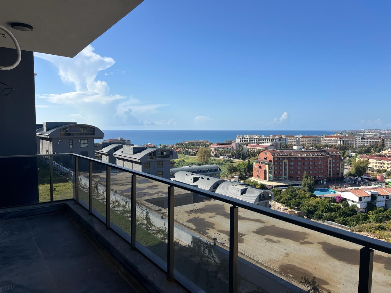 Alanya Konaklı'da deniz manzaralı, modern bir komplekste, şık tasarımlı, yeni 2+1 daire.
