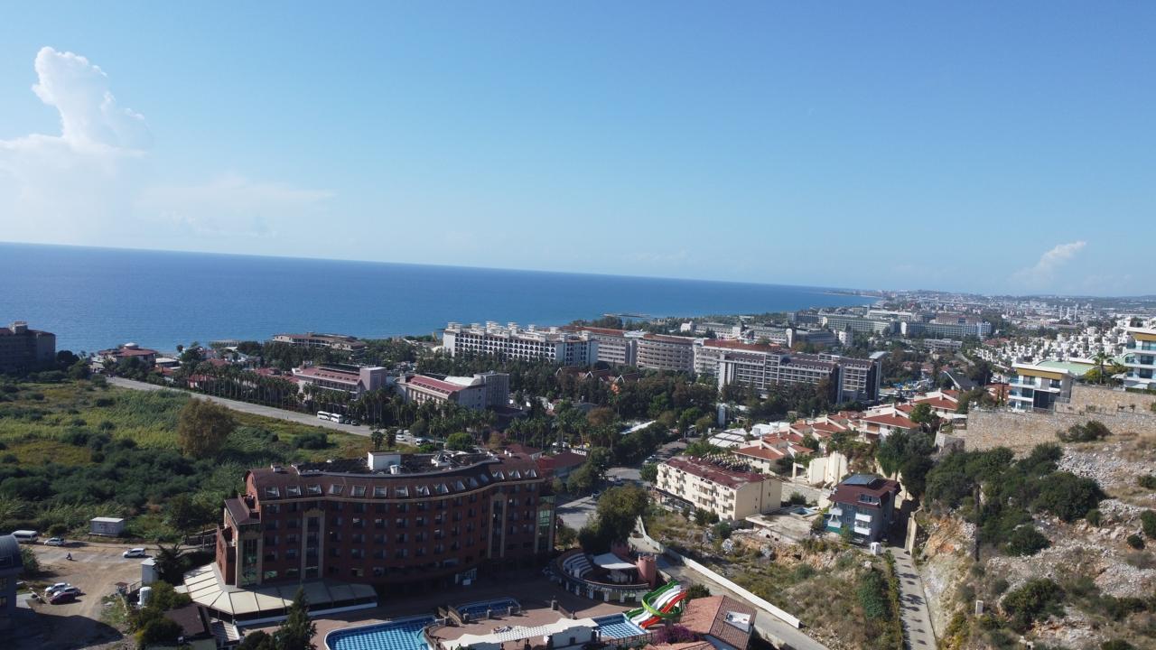 Alanya Konaklı'da deniz manzaralı, modern bir komplekste, şık tasarımlı, yeni 2+1 daire.