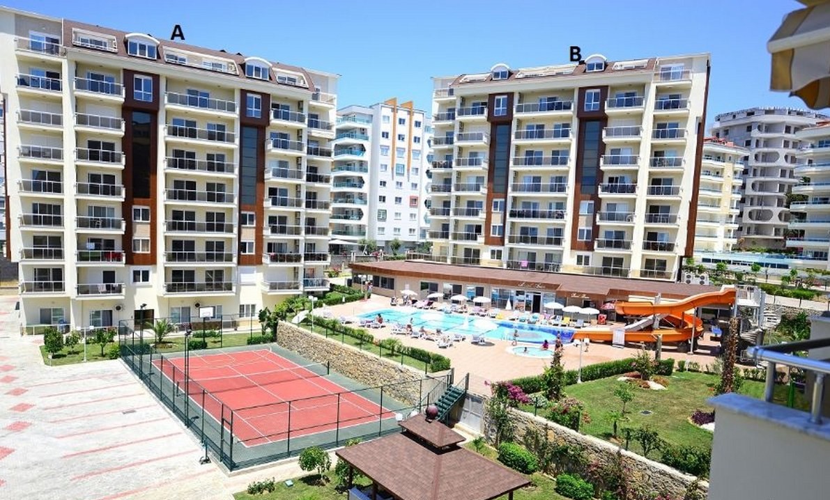 Квартира 1+1 в Авсалларе – мебель, остеклённый балкон и вид на море
