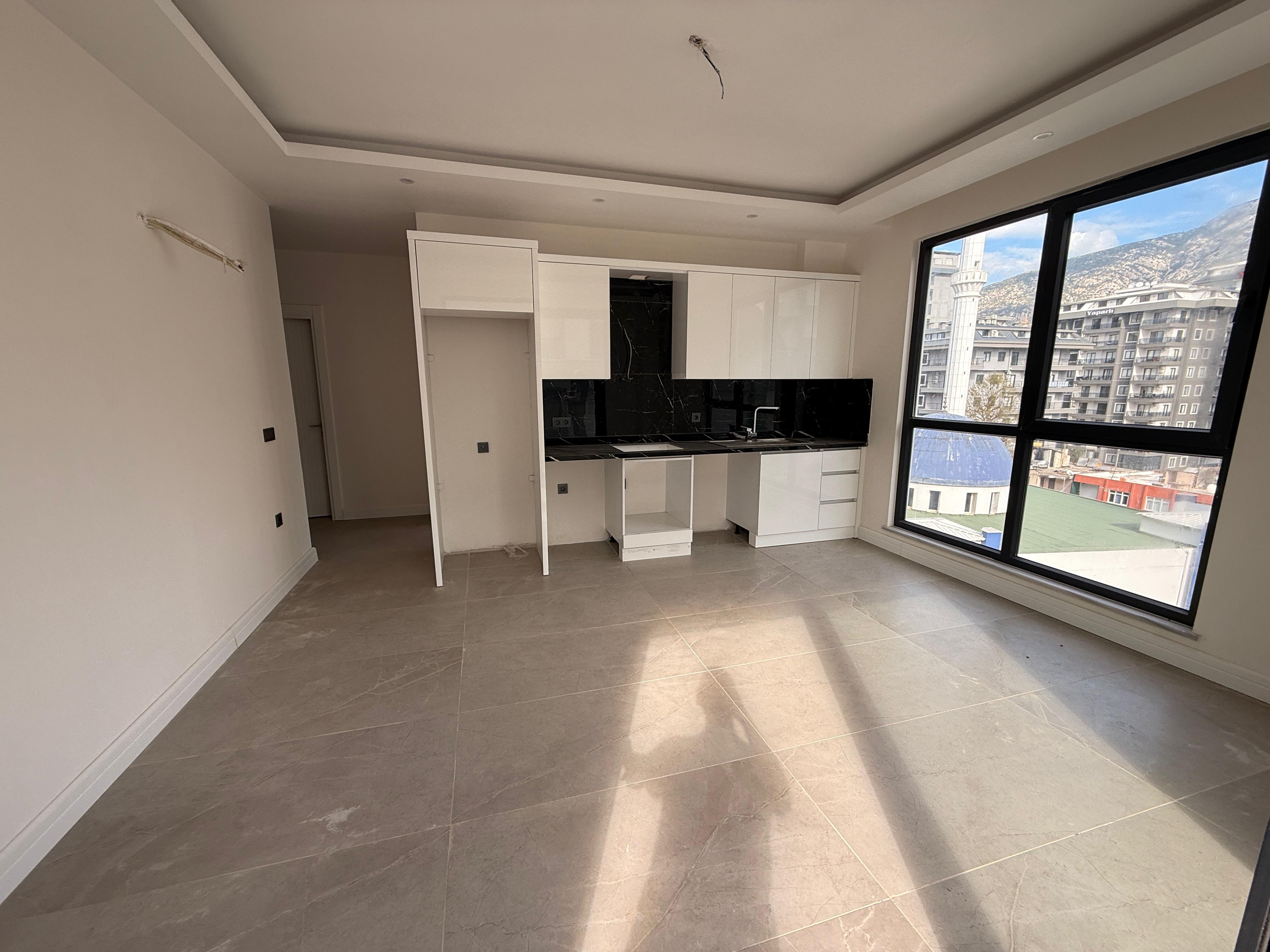 Квартира 1+1 55 м² в Махмутларе – привлекательная цена, новый жилой комплекс, 400 м до моря