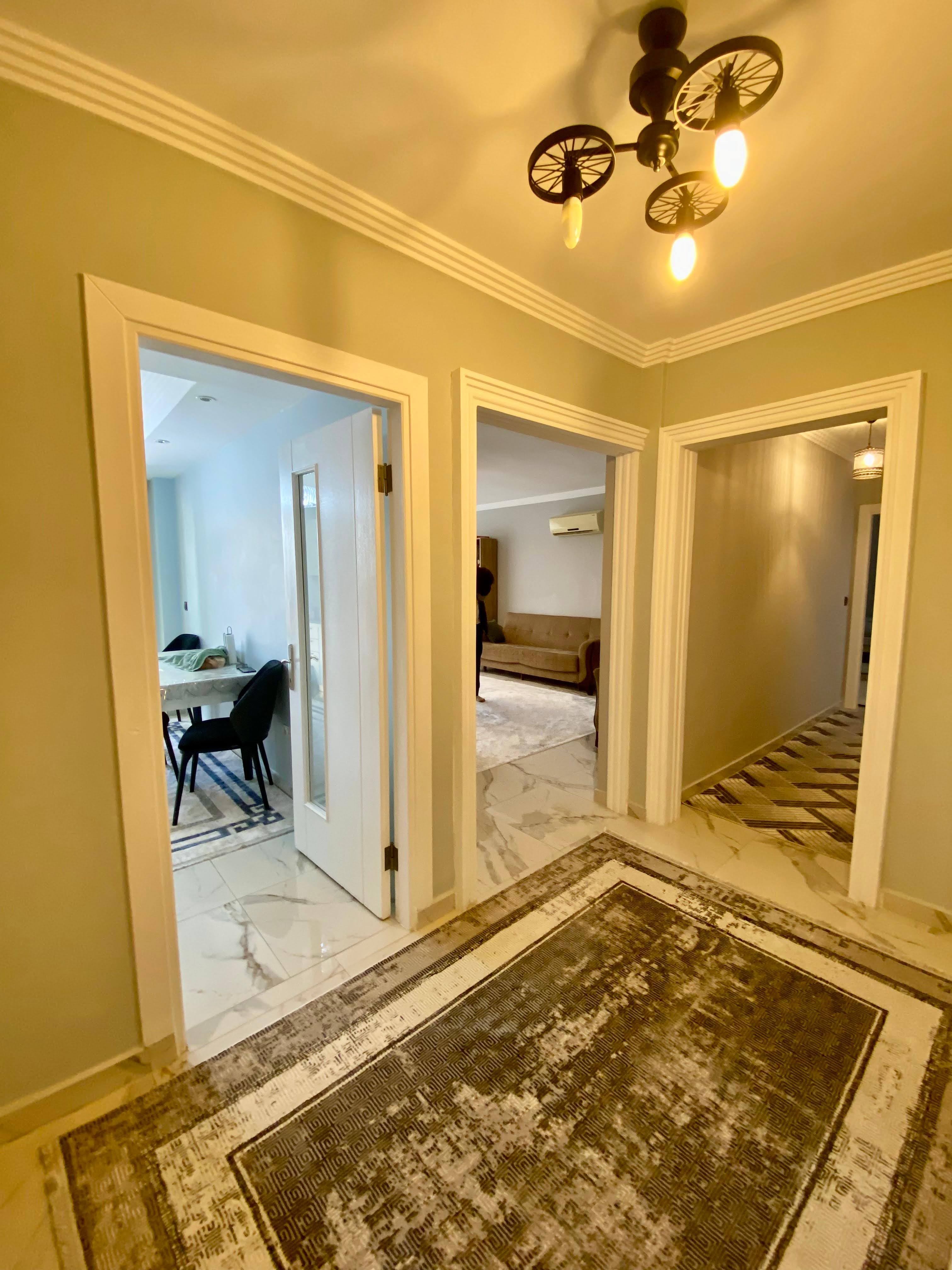 2+1 apartment with sea view in the center of Mahmutlar – furnished, separate kitchen and glazed balcony