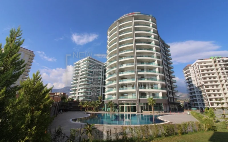 Yuvarlak cepheli konut ve havuzlu site Mahmutlar’da, Alanya’da satılık 1+1 daire Türkiye’de — New Level Group