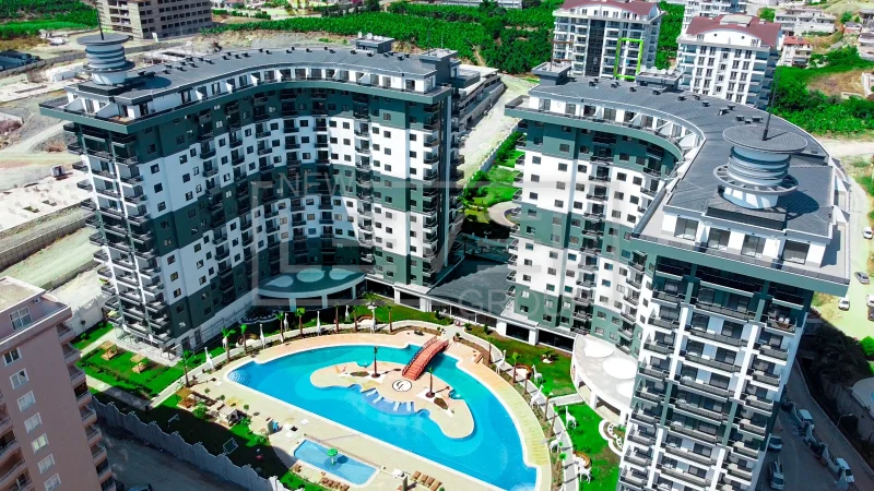 Pool and bridge: 1+1 apartment for sale in Mahmutlar, Alanya, Turkey — New Level Group