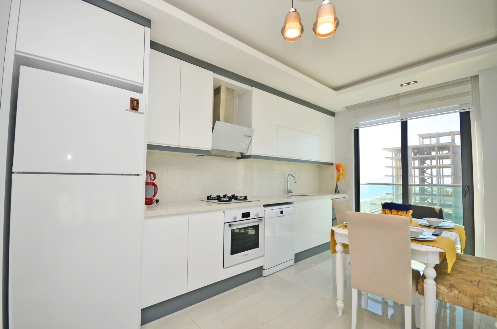 A 2-bedroom apartment on the first line in Mahmutlar – sea view, heated floors, from the owner