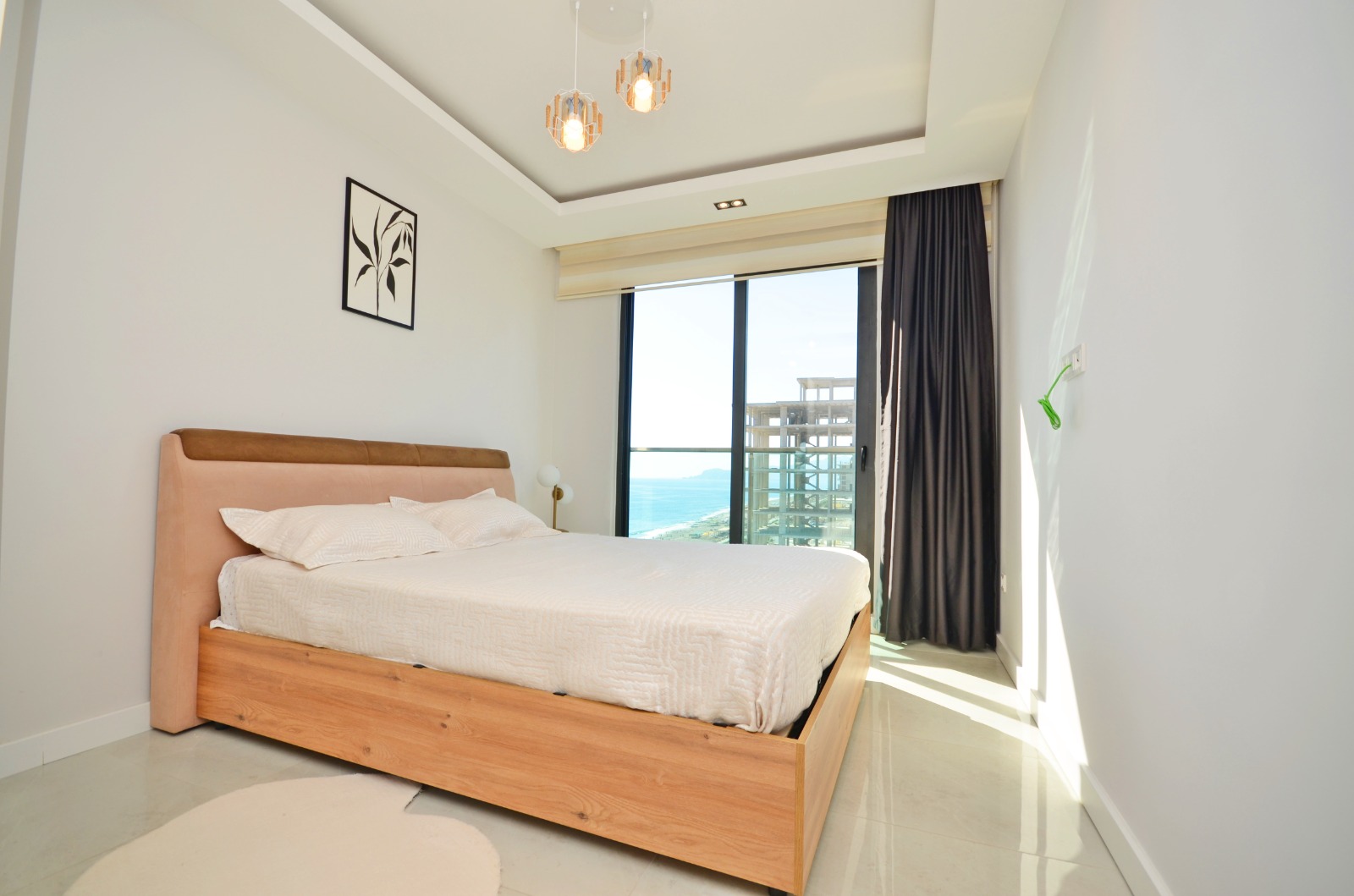 A 2-bedroom apartment on the first line in Mahmutlar – sea view, heated floors, from the owner