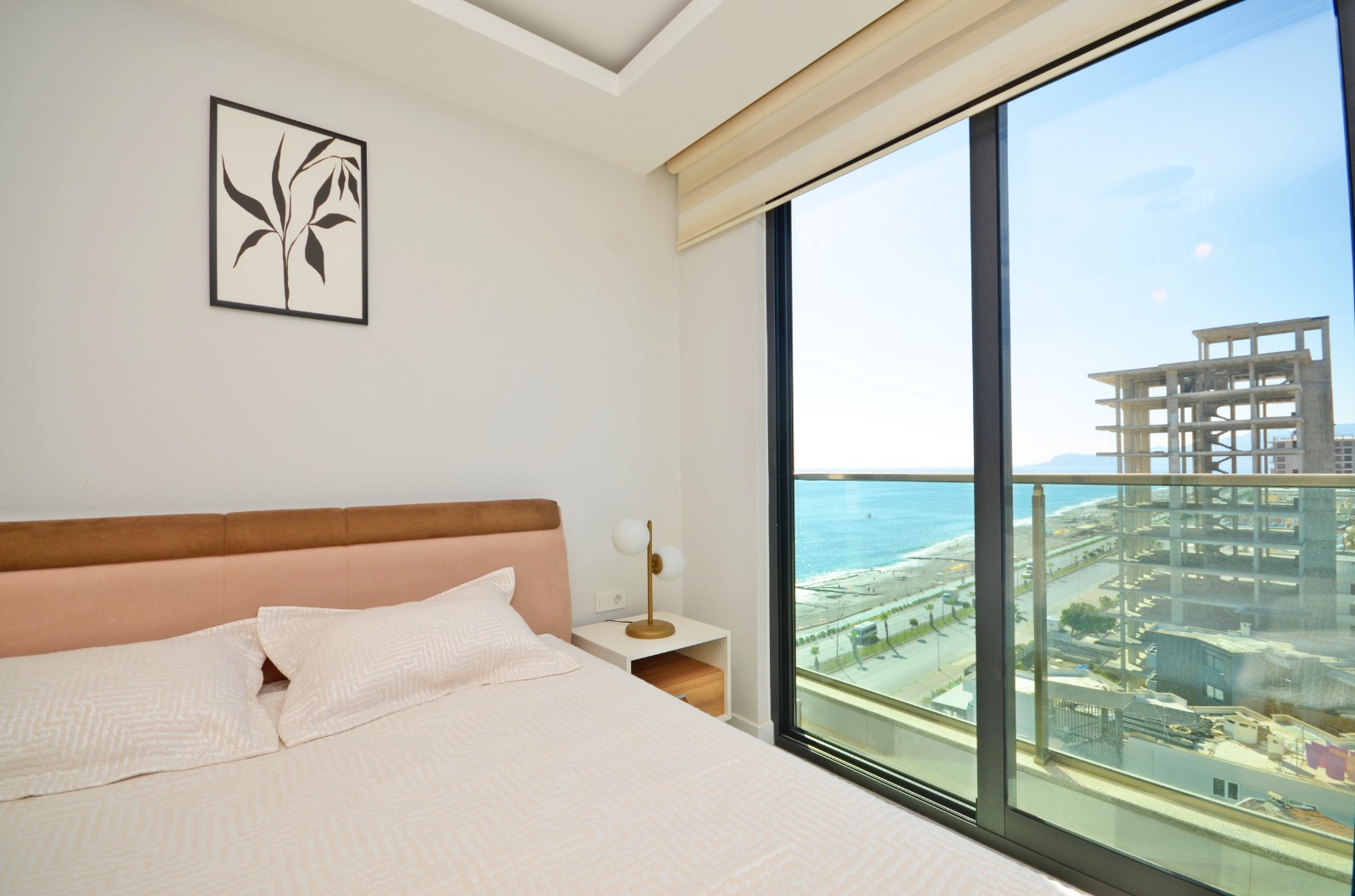 A 2-bedroom apartment on the first line in Mahmutlar – sea view, heated floors, from the owner