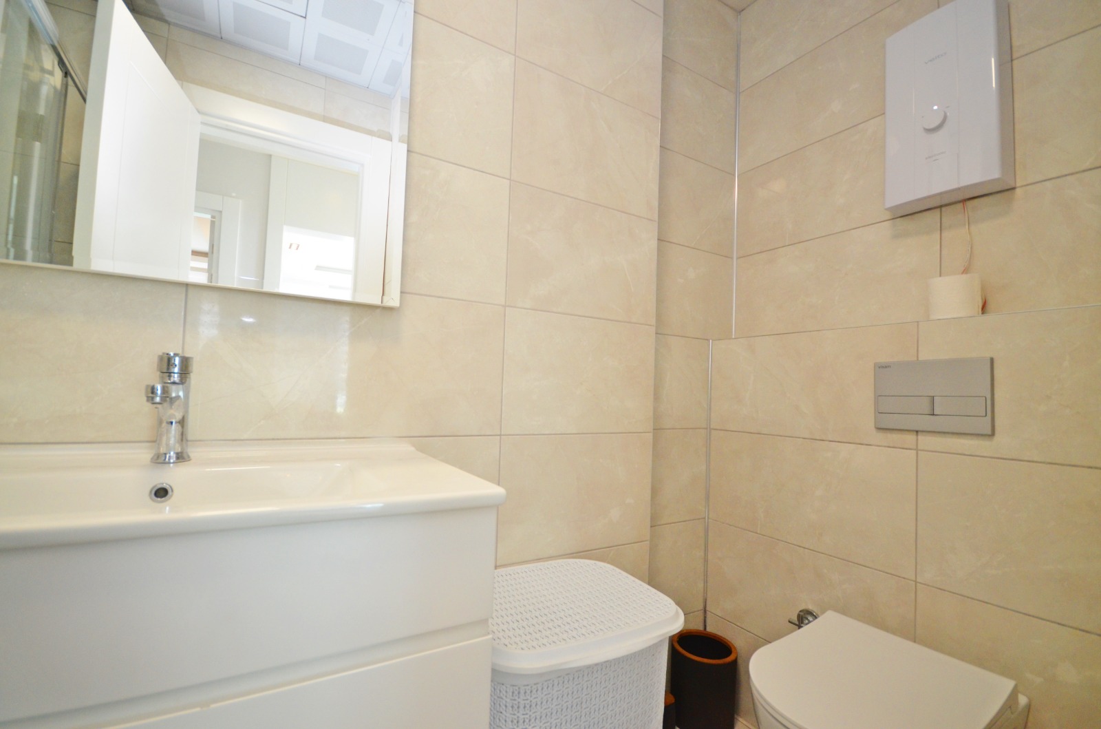 A 2-bedroom apartment on the first line in Mahmutlar – sea view, heated floors, from the owner