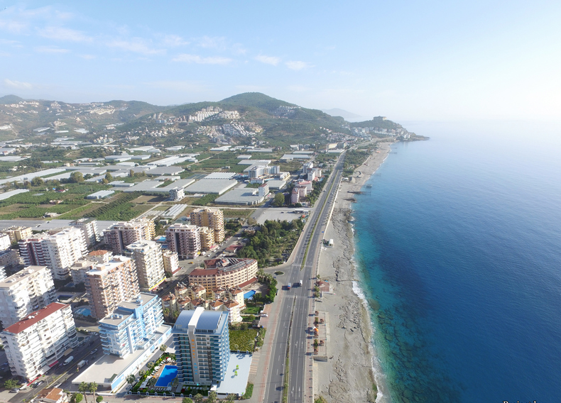 A 2-bedroom apartment on the first line in Mahmutlar – sea view, heated floors, from the owner