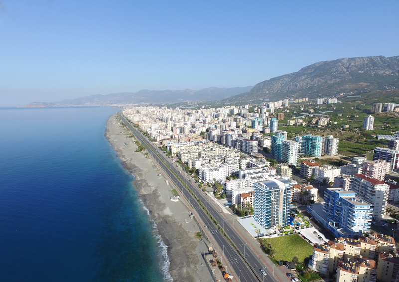 A 2-bedroom apartment on the first line in Mahmutlar – sea view, heated floors, from the owner