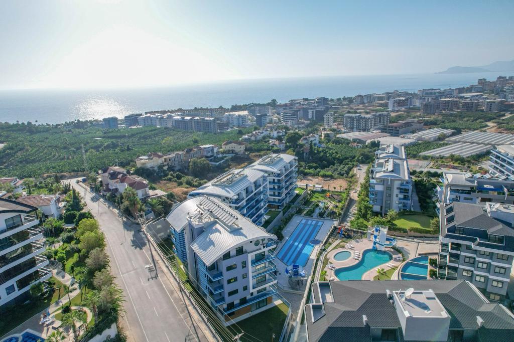 Садовый дуплекс 3+1 в Каргыджаке - собственный участок 300 м²