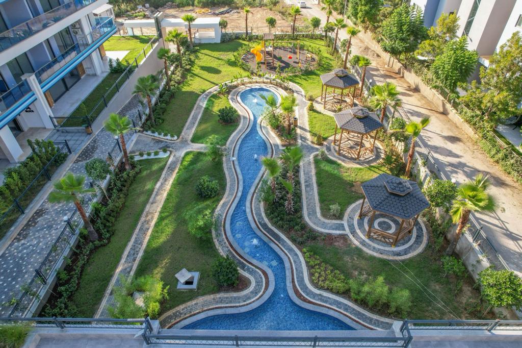 Садовый дуплекс 3+1 в Каргыджаке - собственный участок 300 м²