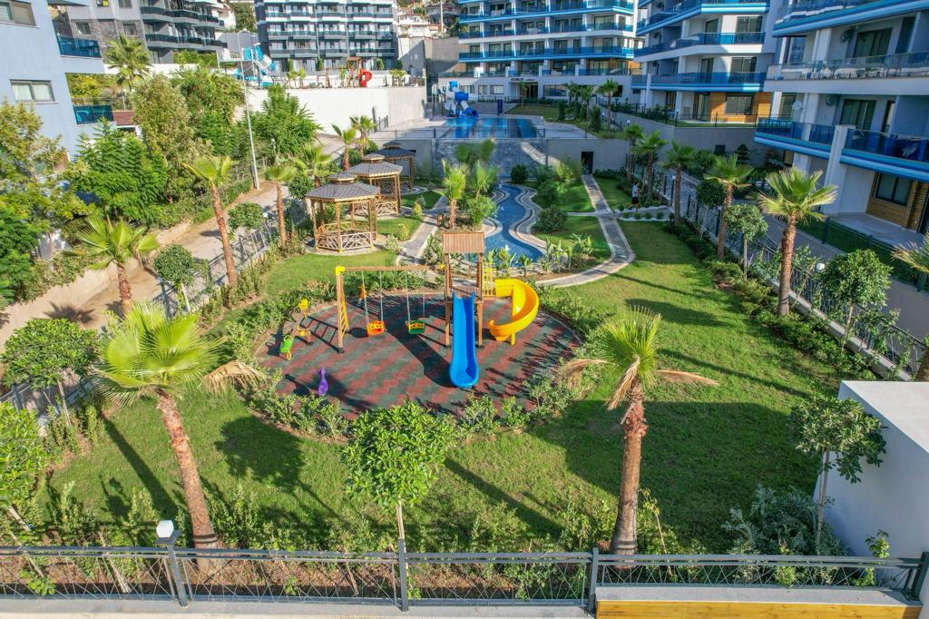 Садовый дуплекс 3+1 в Каргыджаке - собственный участок 300 м²