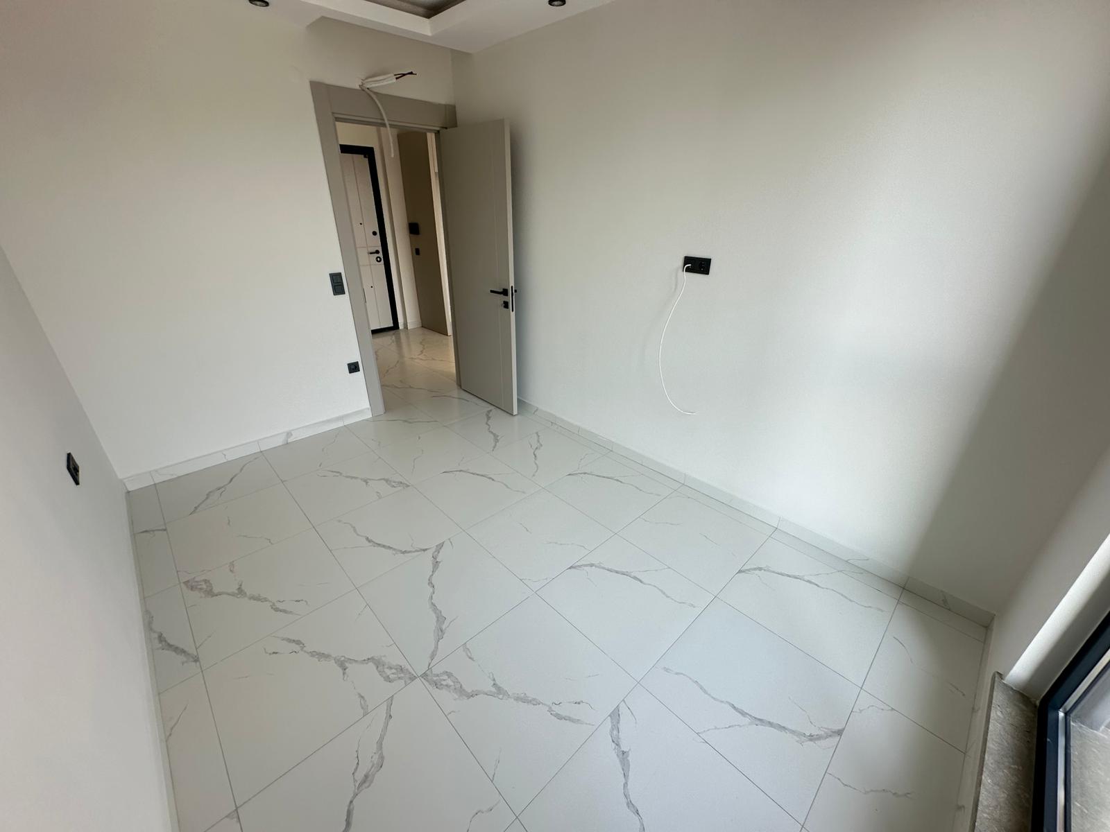 Квартира 1+1 с видом на море на первой линии в Кестеле - 47 м², без мебели, премиум-комплекс