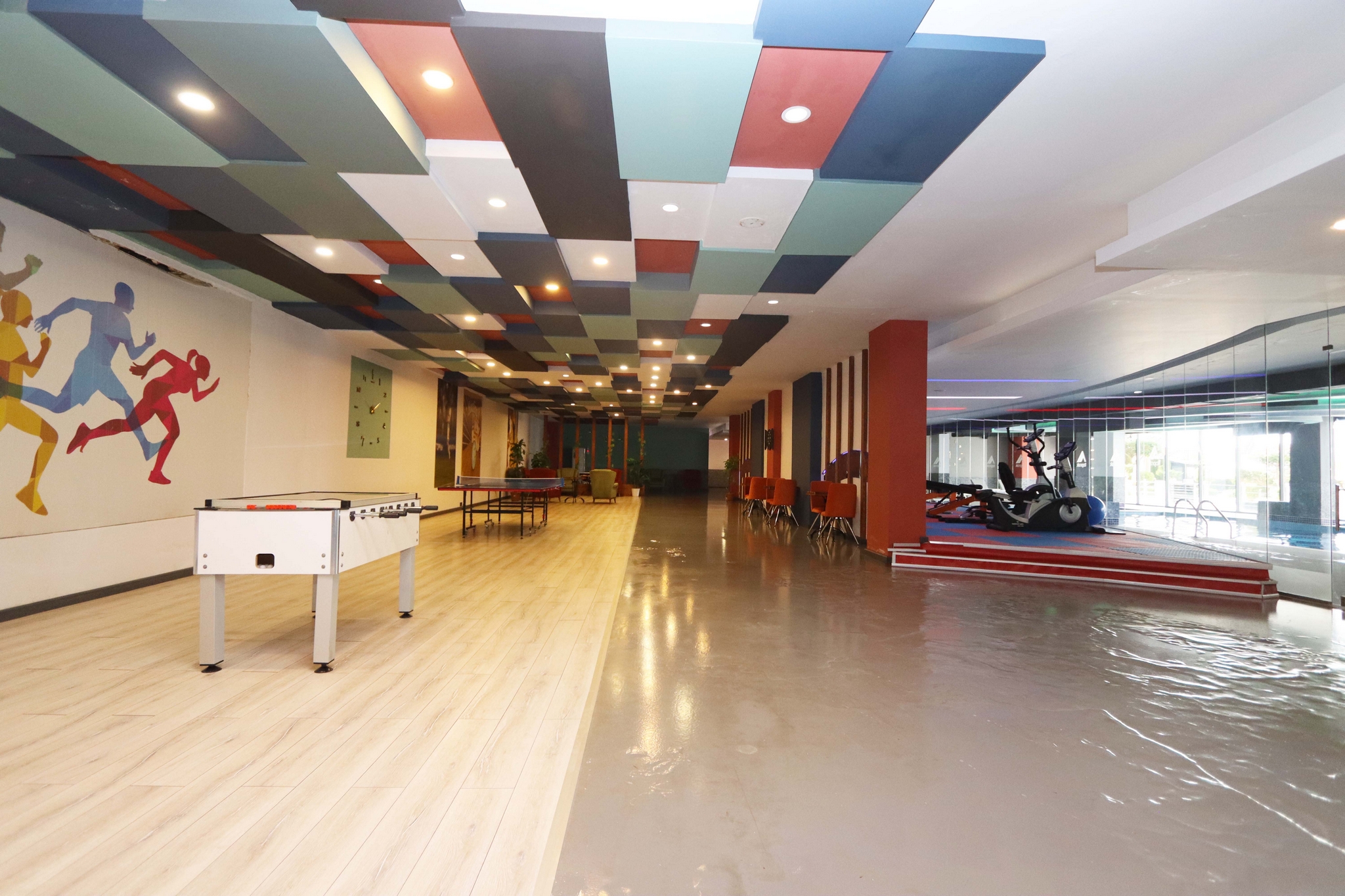 Games area with table football, table tennis and gym equipment for residents of flats in Kargicak