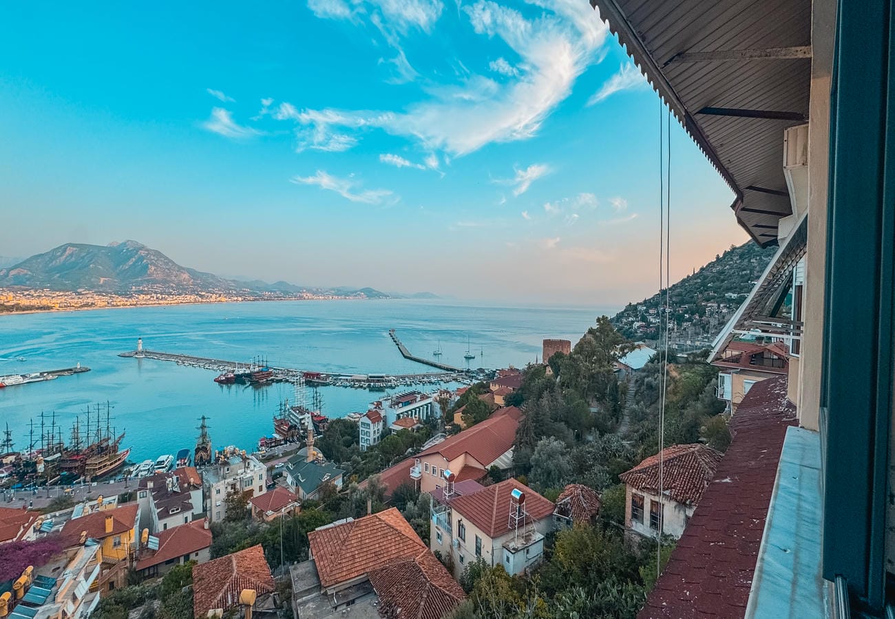 Panoramic sea bay with mountain shore and harbor presents an apartment for sale in Türkiye