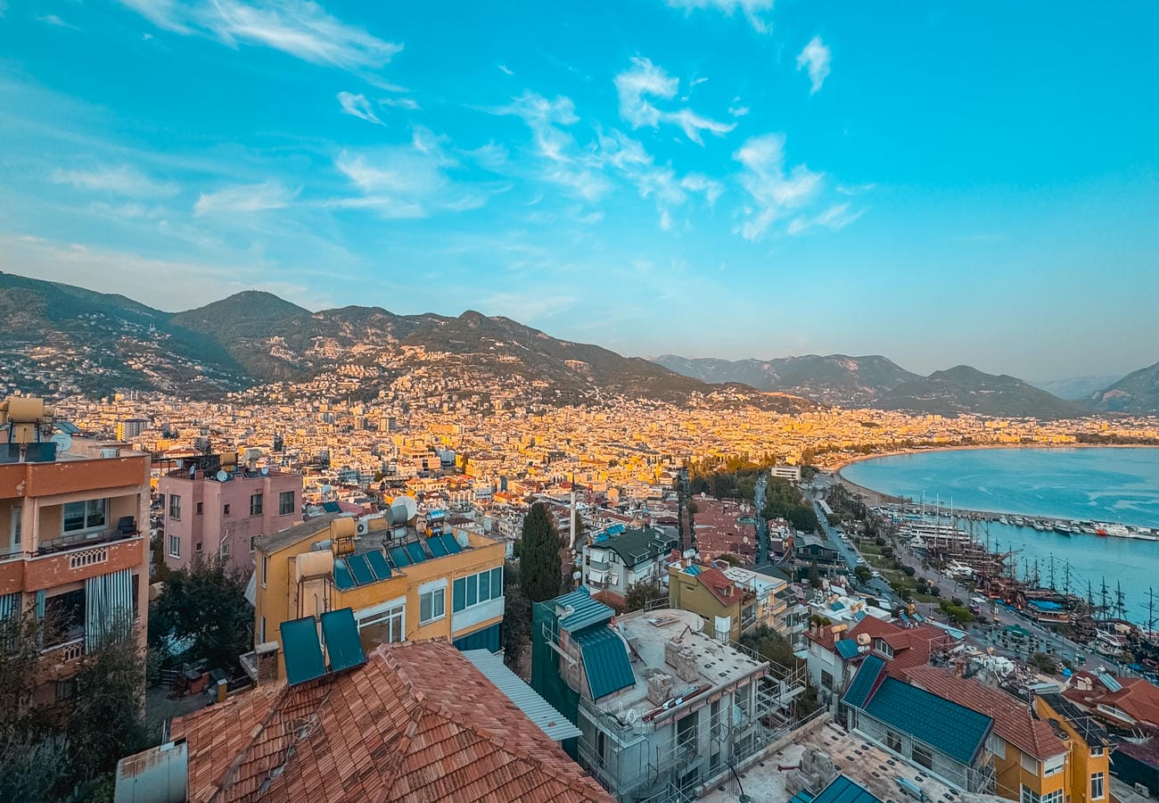 Panoramic bay with yachts and mountain ridge presents a purchase opportunity in Türkiye