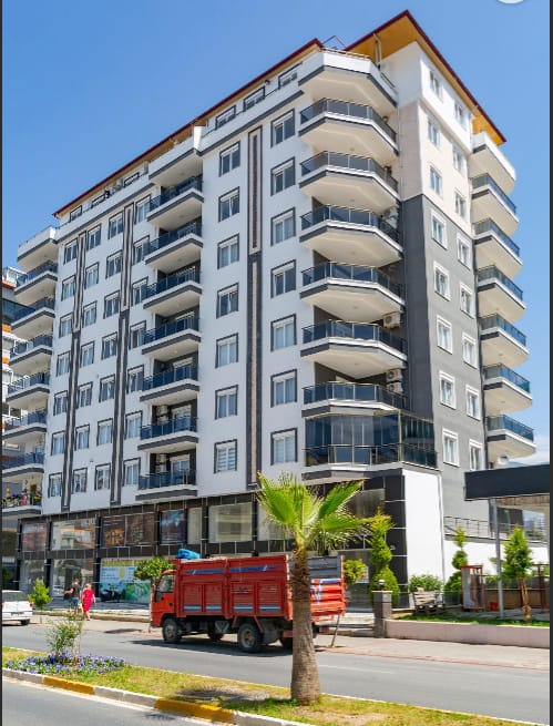 A furnished two-level 3+1 apartment in Mahmutlar – two glazed balconies and a panoramic sea view