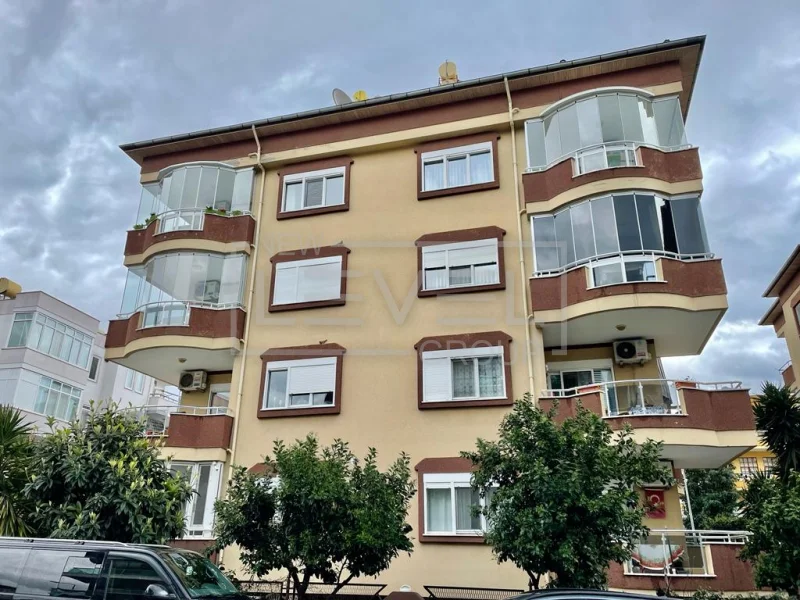 Bordo detaylı bej cephe: Alanya'nın Oba semtinde satılık 3+1 dubleks, Türkiye — New Level Group