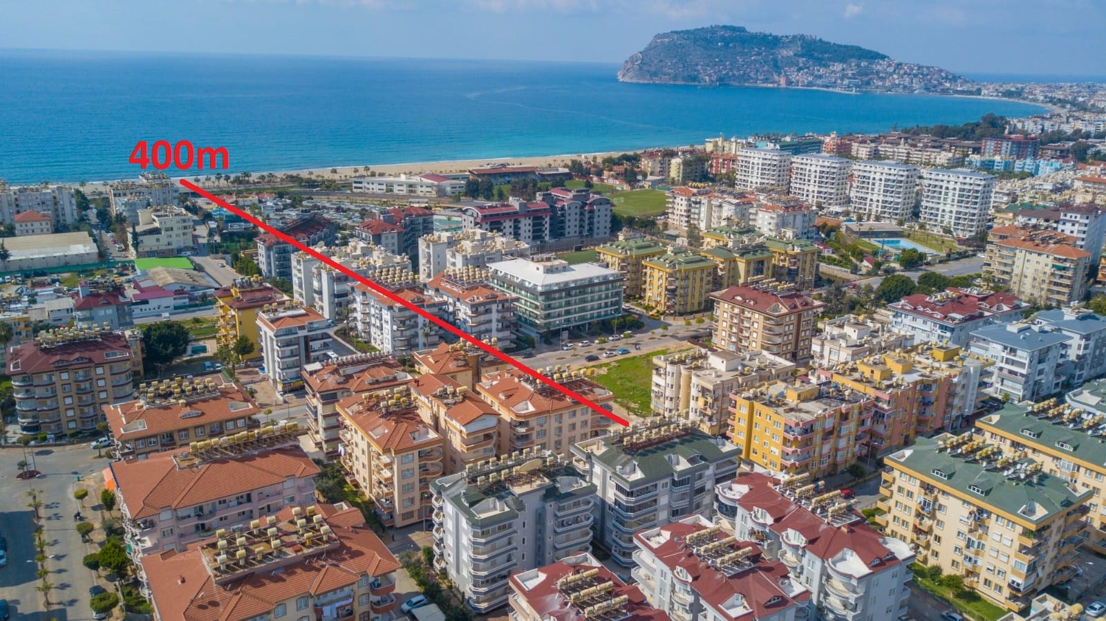 Deniz ve kumlu plaj panoraması: Alanya’nın Oba semtinde satılık 2+1 daire, Türkiye — New Level Group