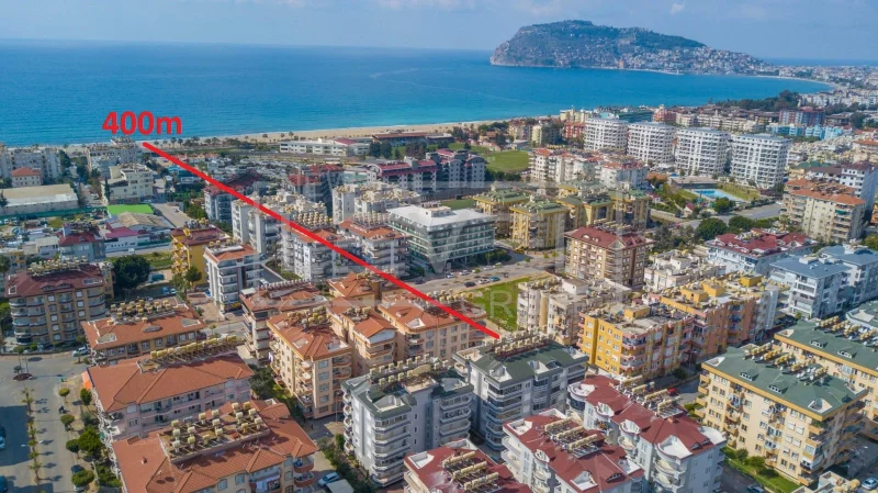 Deniz ve kumlu plaj panoraması: Alanya’nın Oba semtinde satılık 2+1 daire, Türkiye — New Level Group