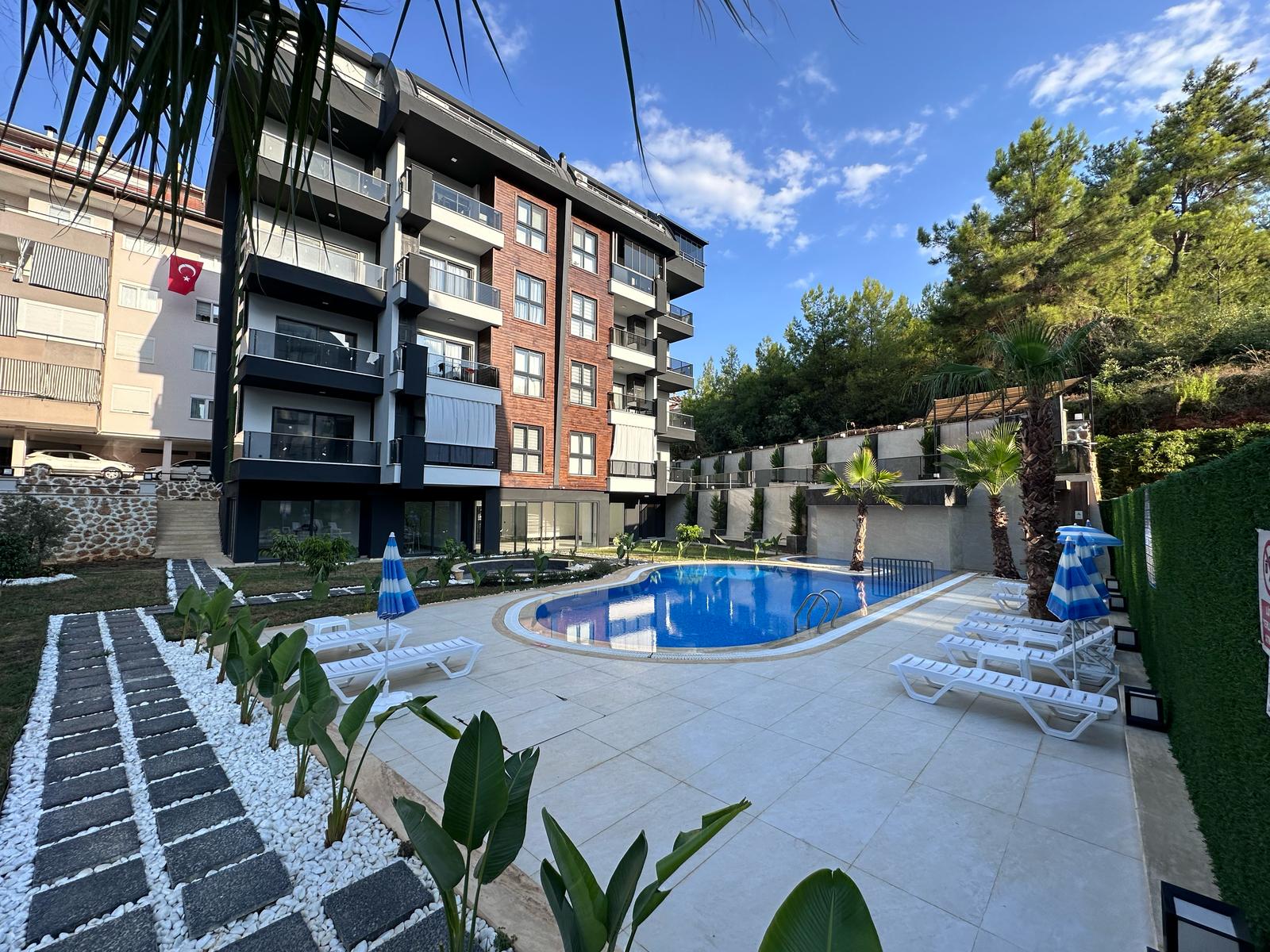 Açık havuzlu balkonlu yüksek blok: Oba, Alanya’da satılık 1+1 daire, Türkiye — New Level Group