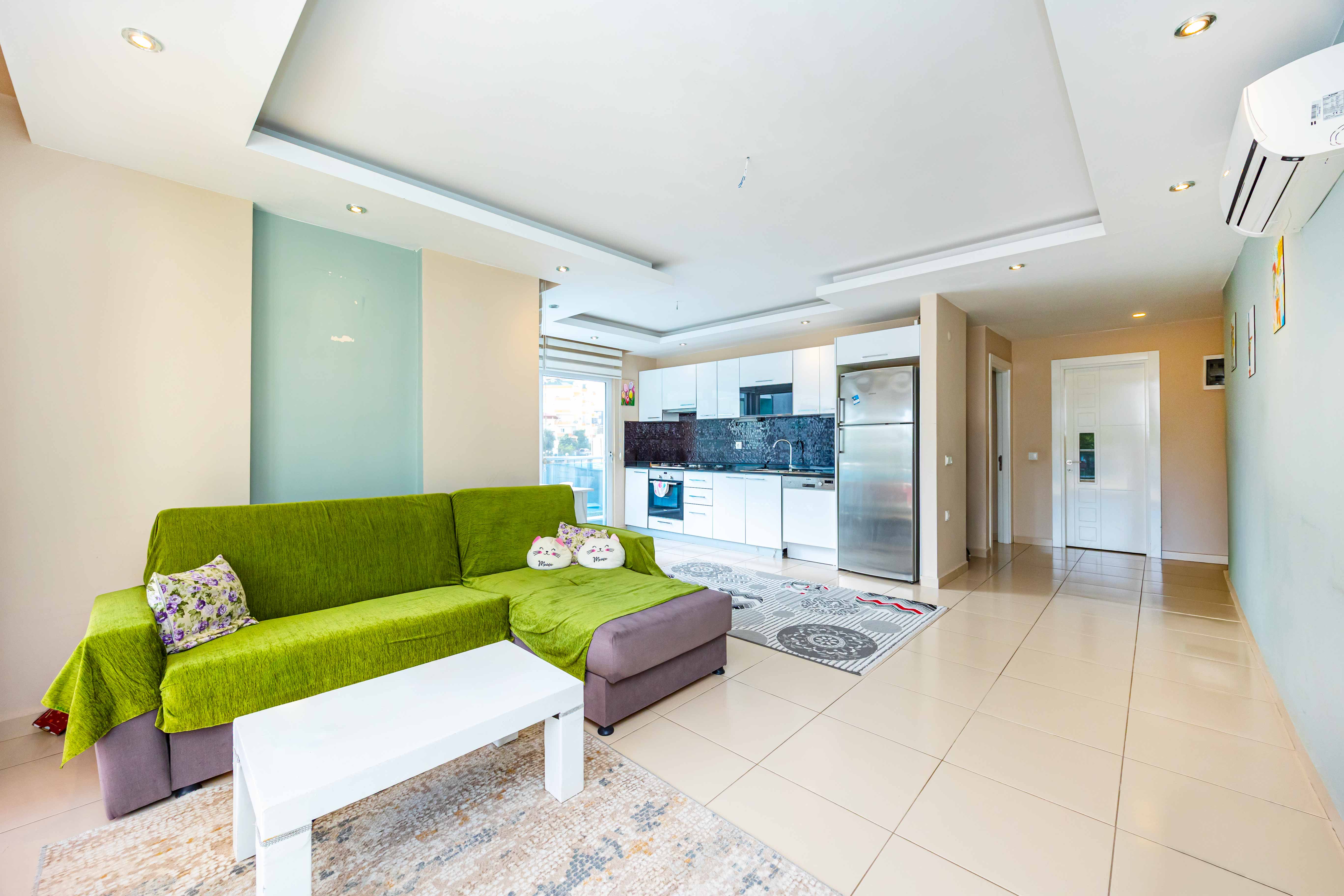 Oba bölgesinde 1+1 daire – eşyalı ve geniş teraslı